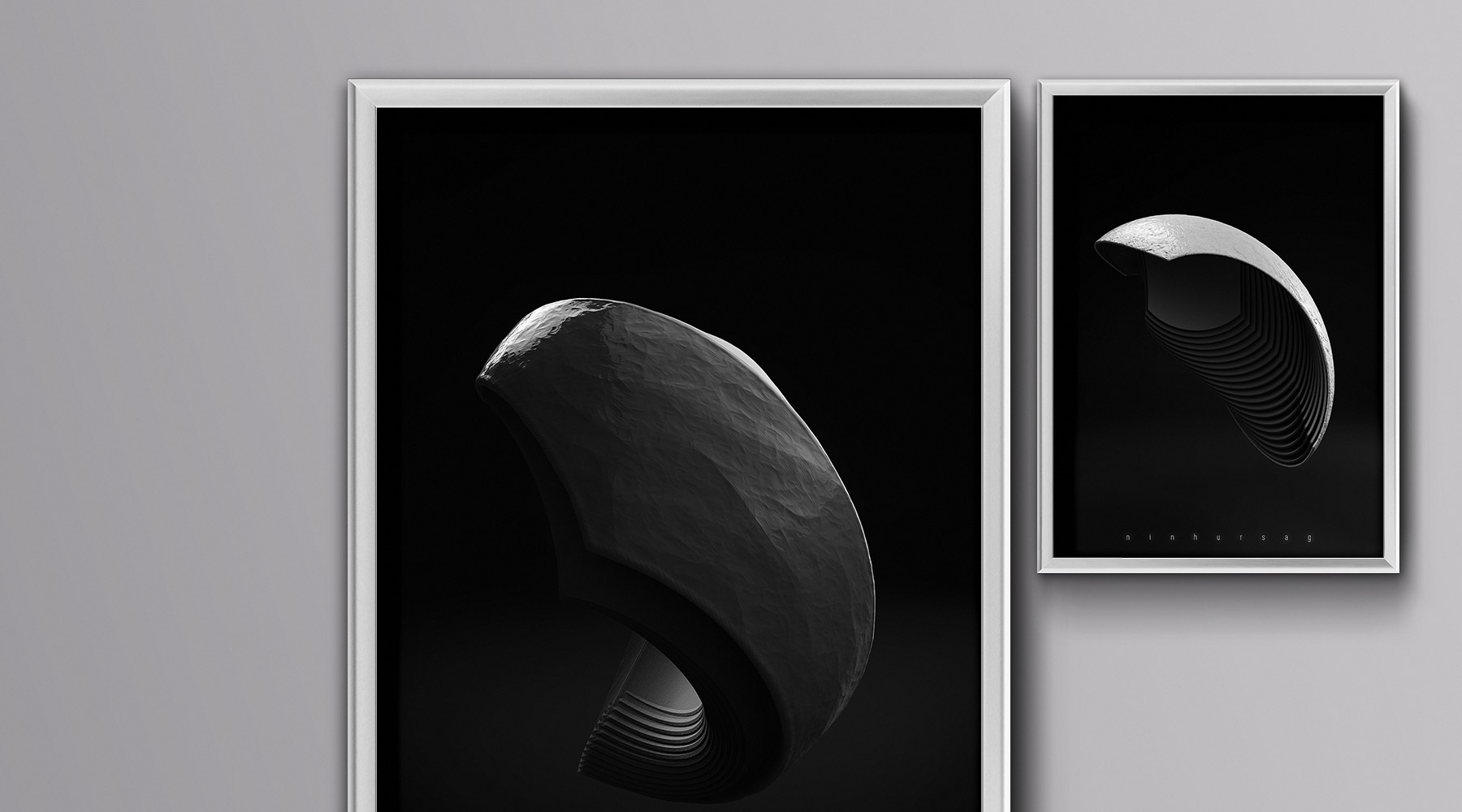 Two frames on a wall holding different Metaphorm 3D artwork posters