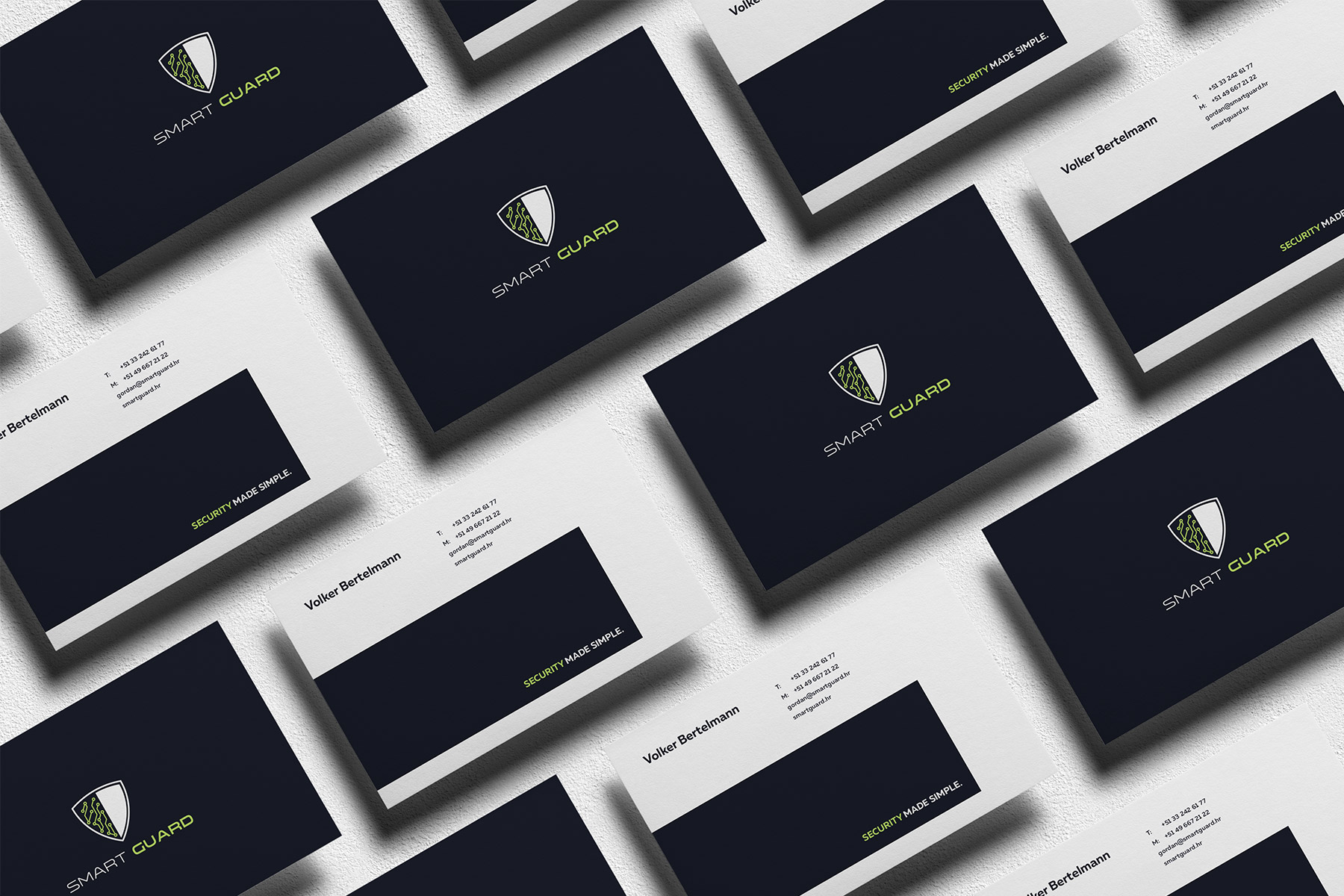 Many Villain branded business cards on a light surface